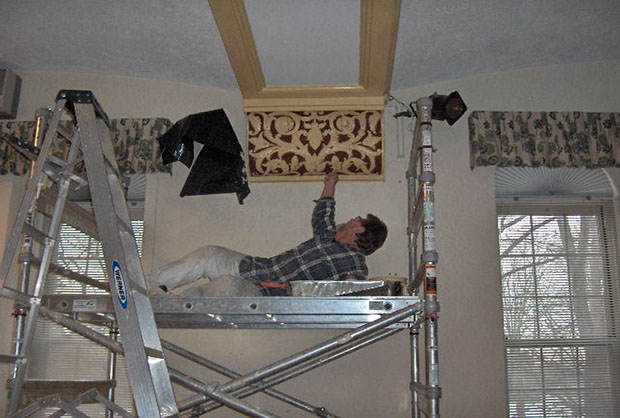 dave painting in tough postion