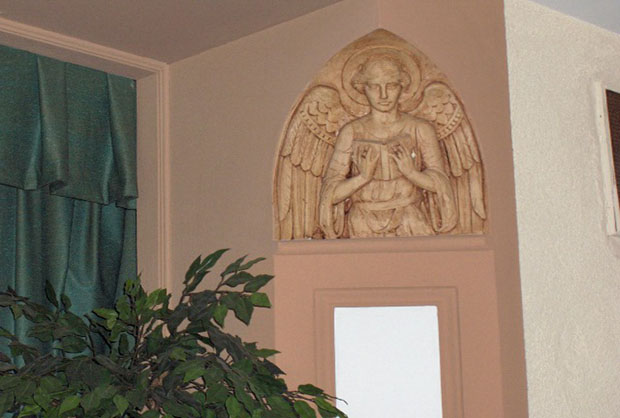 embedded statue